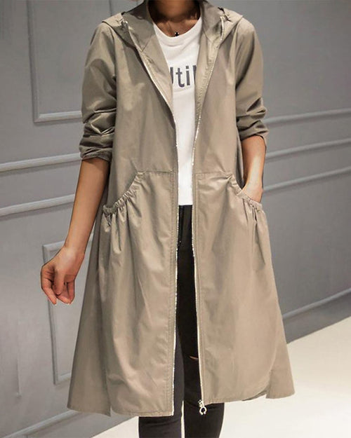 Adrienne | Trench Coat Women Love in a Pleated Longline Fit